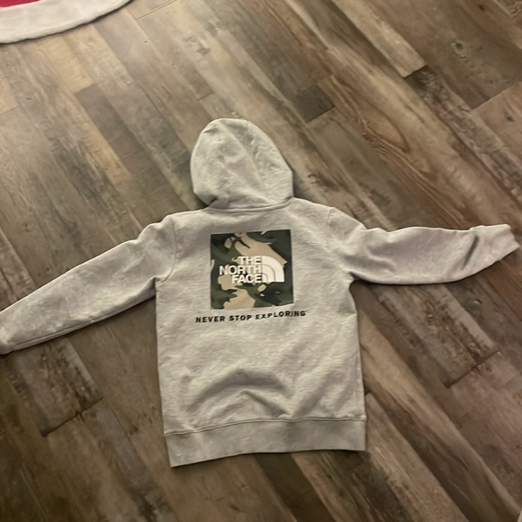 A grey kids never stop exploring sweatshirt. Size 10-12. - Picture 4 of 5